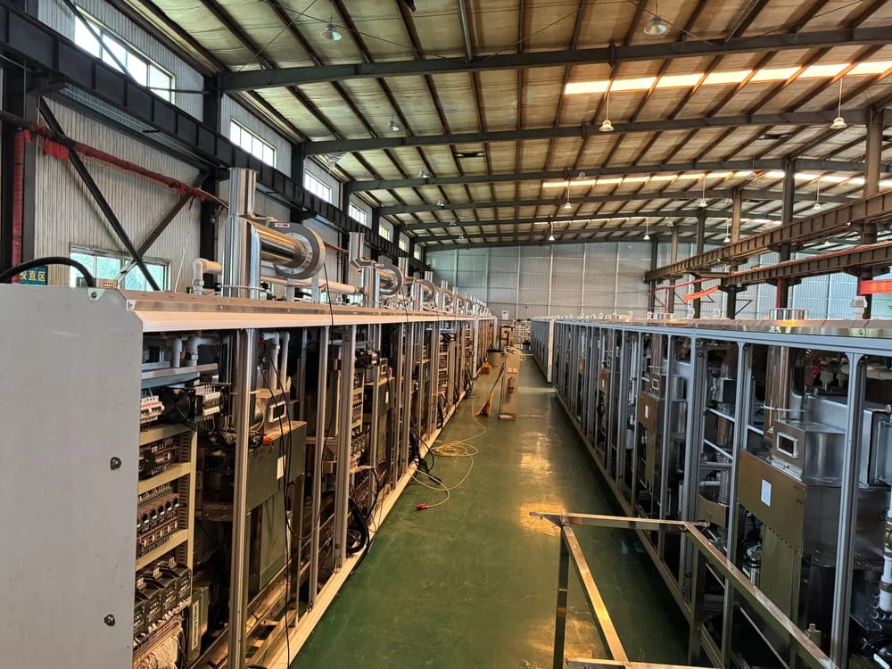Grand Machinery production floor with softgel and gummy equipment lines being assembled
